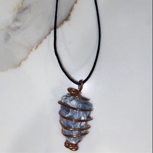 Blue calcite crystal with copper necklace
